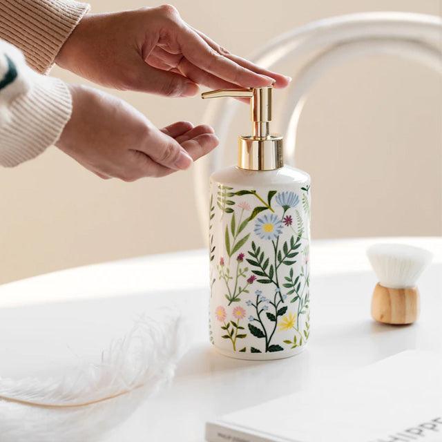 Junips | Soap dispenser made of ceramic with floral design
