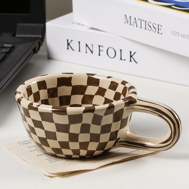 Junips | Ceramic mug with irregular checkerboard pattern