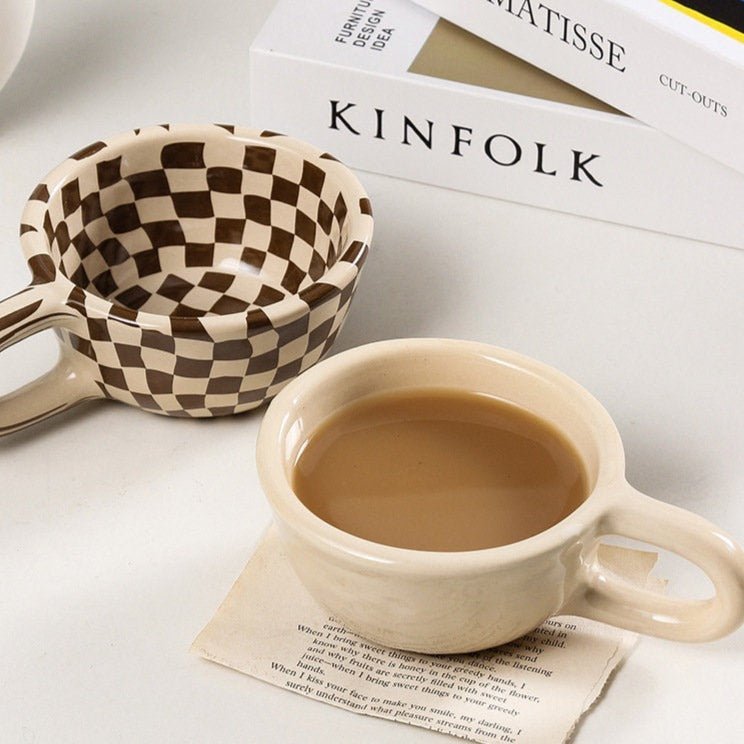 Junips | Ceramic mug with irregular checkerboard pattern