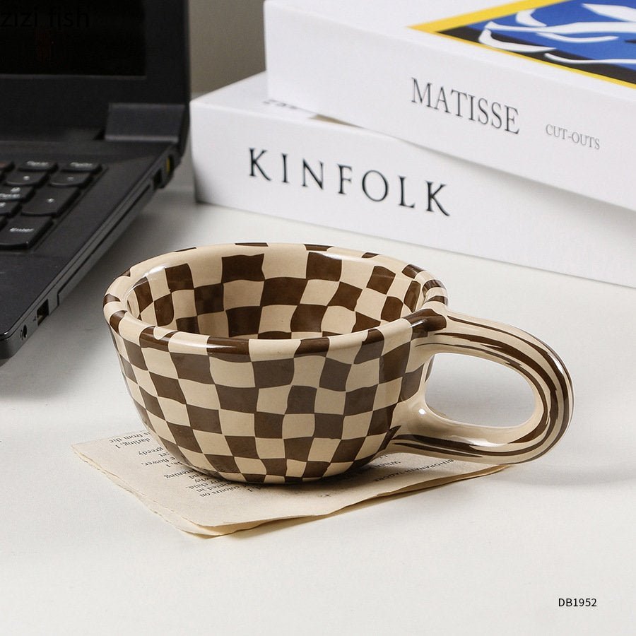 Junips | Ceramic mug with irregular checkerboard pattern