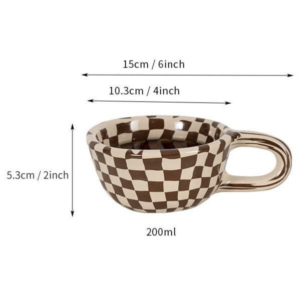 Junips | Ceramic mug with irregular checkerboard pattern
