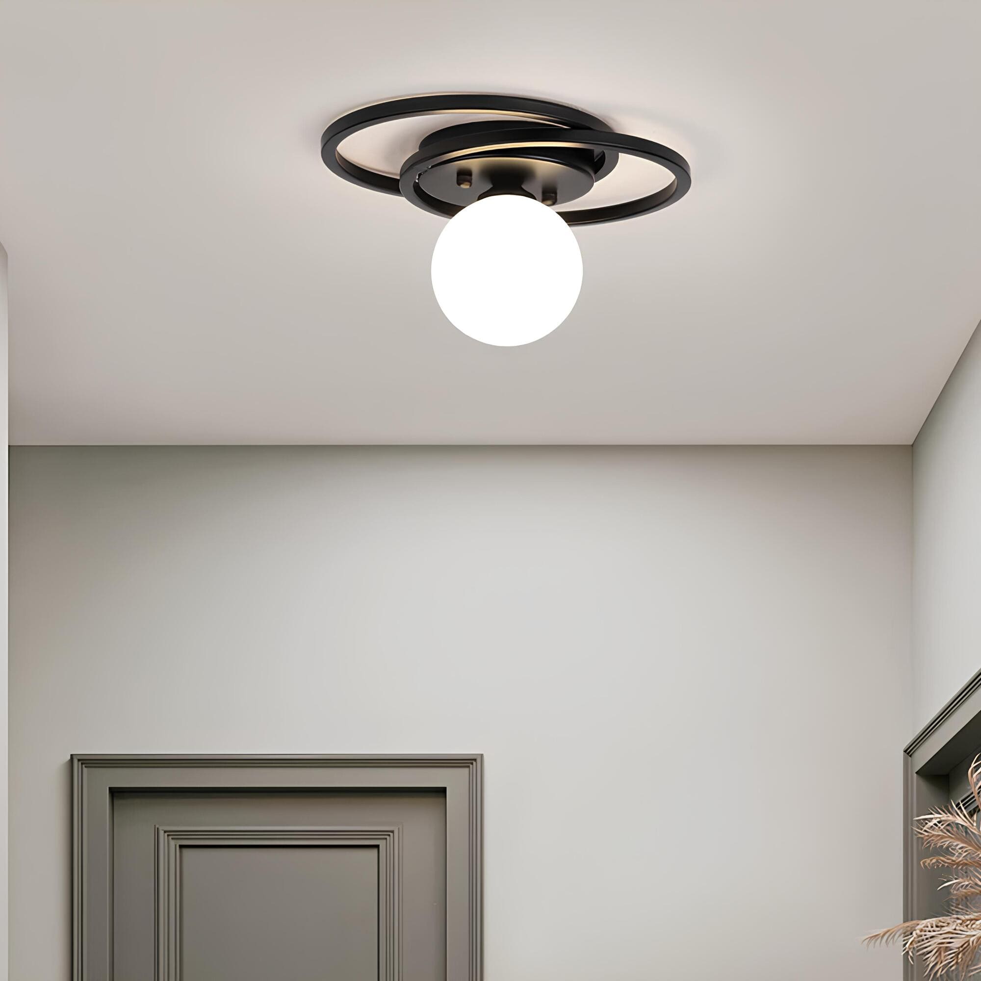 Junips | LumiNoble | Timeless ceiling light with golden LED ball design