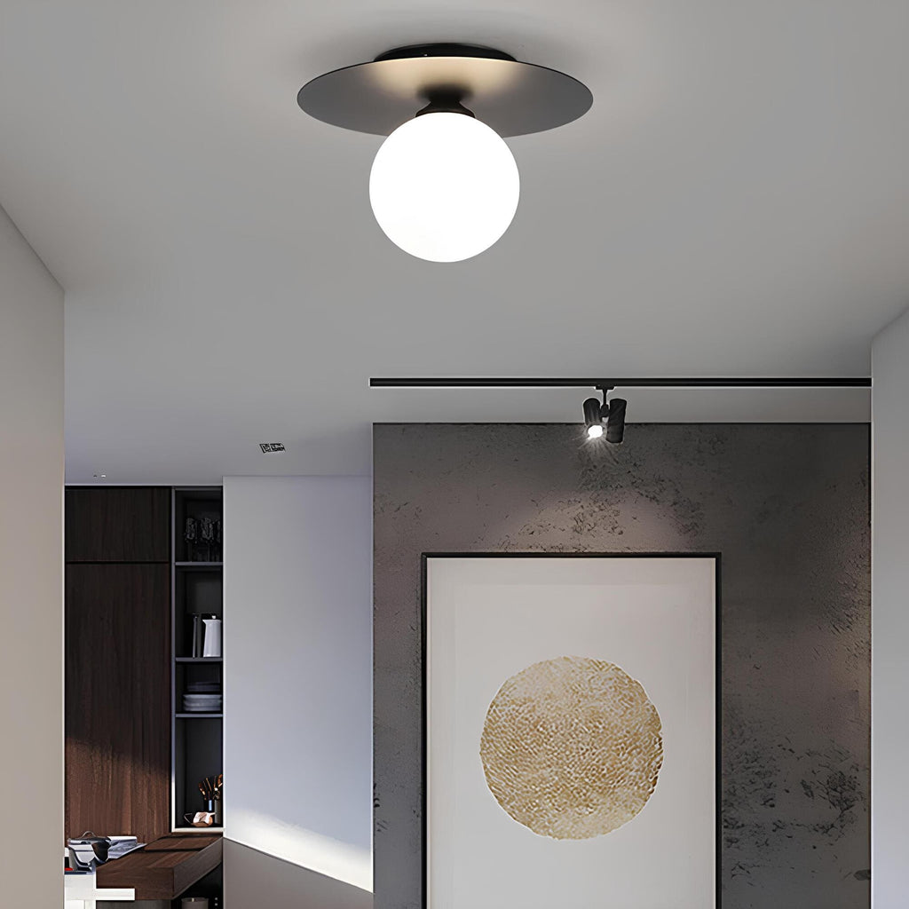 Junips | LumiNoble | Timeless ceiling light with golden LED ball design
