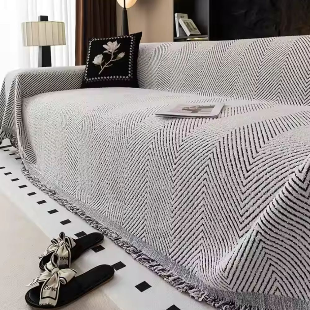 Junips | CUSHVIVE – Herringbone Sofa Cover with Splash Protection and Non-Slip Design