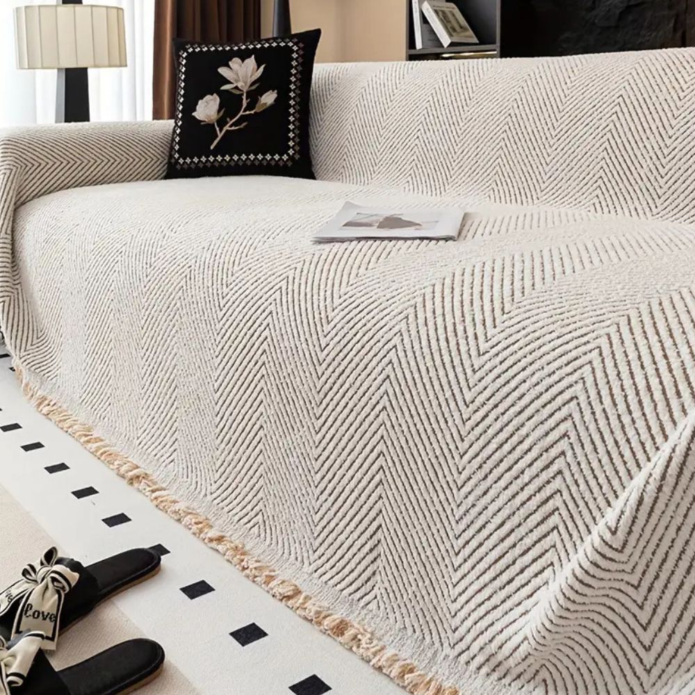 Junips | CUSHVIVE – Herringbone Sofa Cover with Splash Protection and Non-Slip Design
