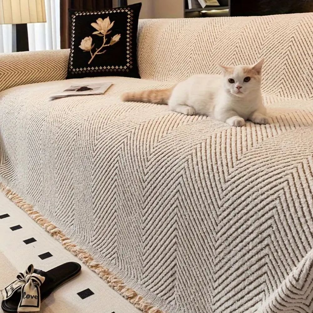 Junips | CUSHVIVE – Herringbone Sofa Cover with Splash Protection and Non-Slip Design