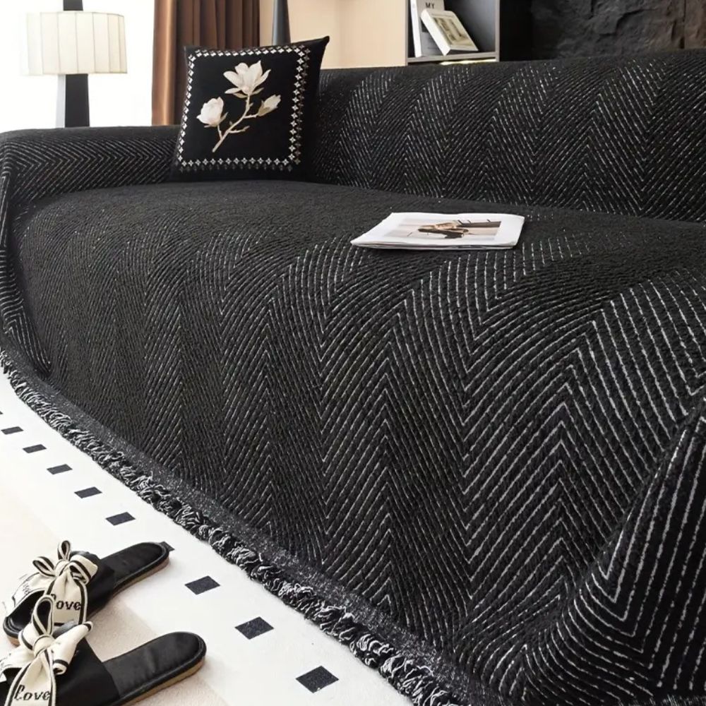 Junips | CUSHVIVE – Herringbone Sofa Cover with Splash Protection and Non-Slip Design