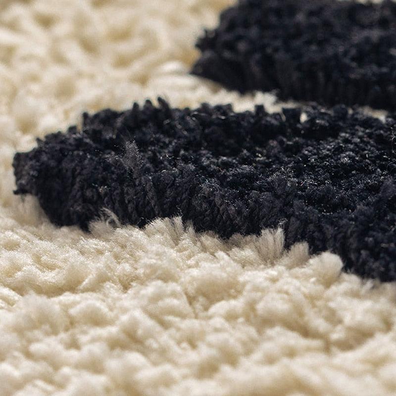 Junips | Bath mat with tits