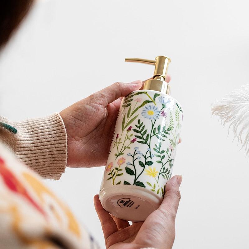 Junips | Soap dispenser made of ceramic with floral design